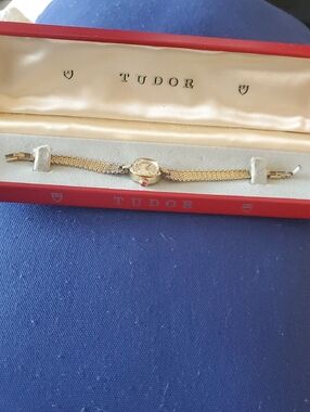 Tudor Women’s Gold-Tone Mesh Bracelet Watch with Red Crown Accent